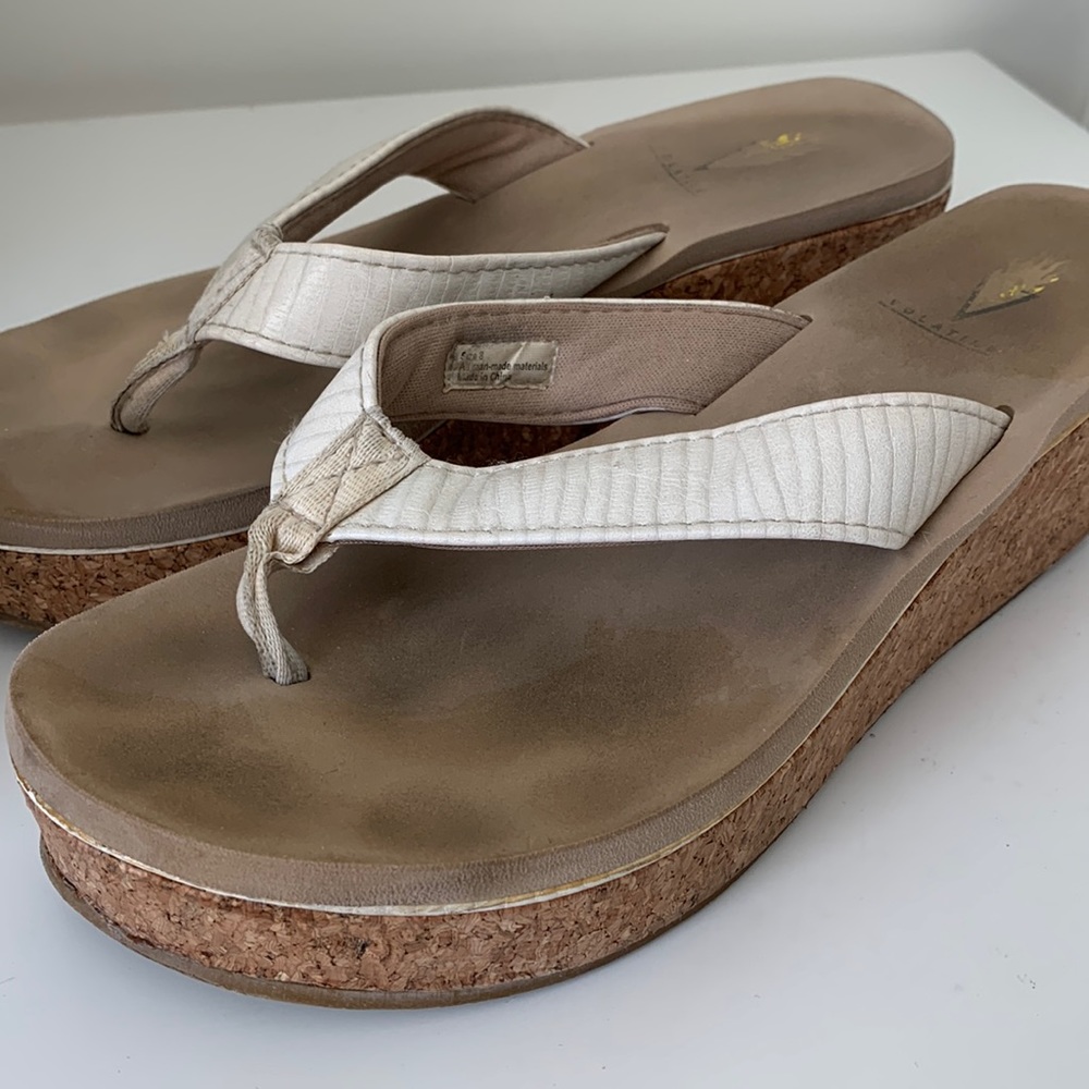 Volatile platform sandals in cream with cork bottoms. Size 8